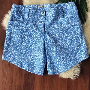 Blue and white Adidas athletic shorts